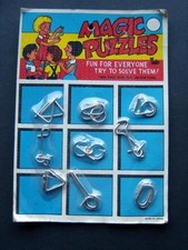 Magic Puzzles 9 Metal Tricks MOC Japan Instructions on Back 6" by 9"