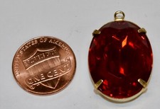 VINTAGE RED BEVELLED GLASS BEAD lg OVAL PENDANT • 25 x 18mm. 1 in SET IN BRASS