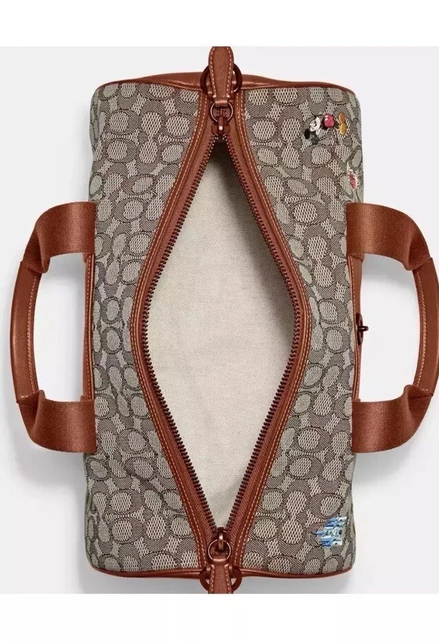 Bolso de viaje Mickey Mouse de cuero jacquard marrón firma Disney X Coach Foto 3 de 4