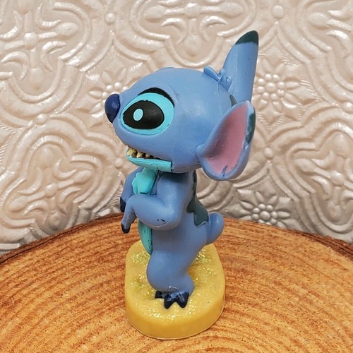 Lote de 2 estatuillas de PVC puntada. Beach Alien. Figura Disney Lilo & Stitch. - Imagen 6 de 12