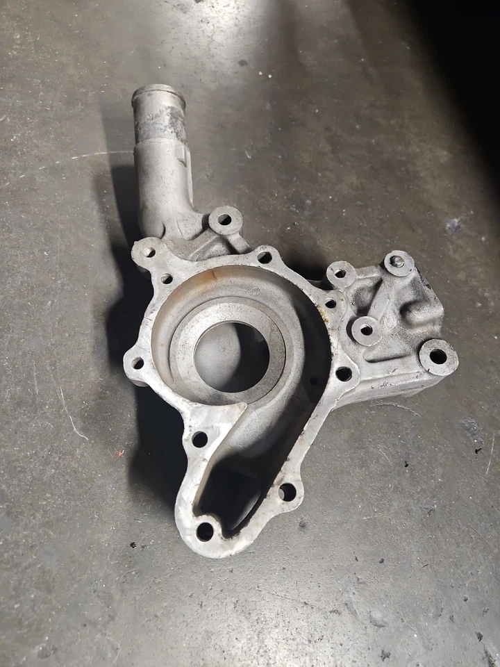 Mazda RX7 1989 carcasa de bomba de agua Foto 2 de 4