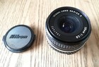 Nikon e 28mm 28 mm f 2.8 serie E ,utilizzabile su digitali. O analogico nikkor