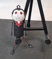 Pier 1 Halloween Vampire Metal Ornament  Fangs Dangling Legs Glitter 4.25"
