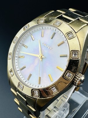Working DKNY NY8661 Mother of Pearl Dial Gold Tone Band Crystal Accents Watch N0