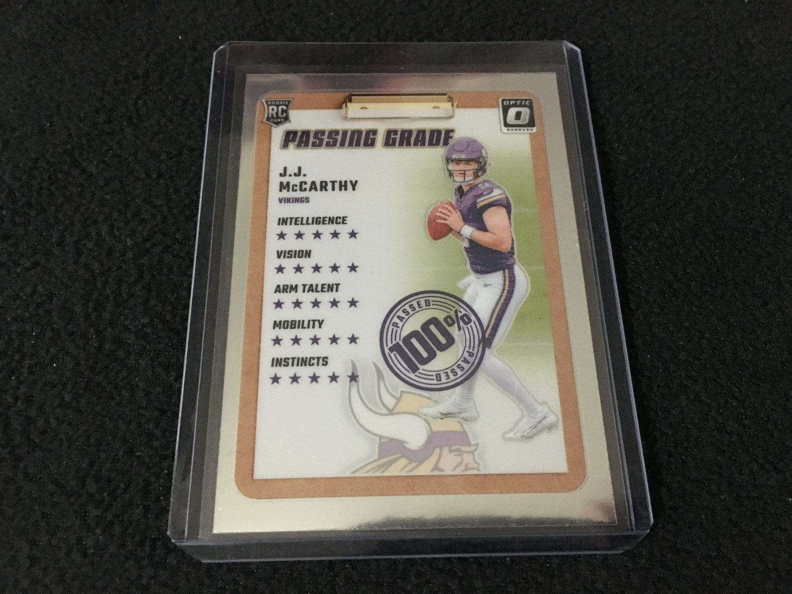 2024 Panini Donruss Optic - JJ McCarthy - Rookie (RC) Passing Grade #6 - Vikings