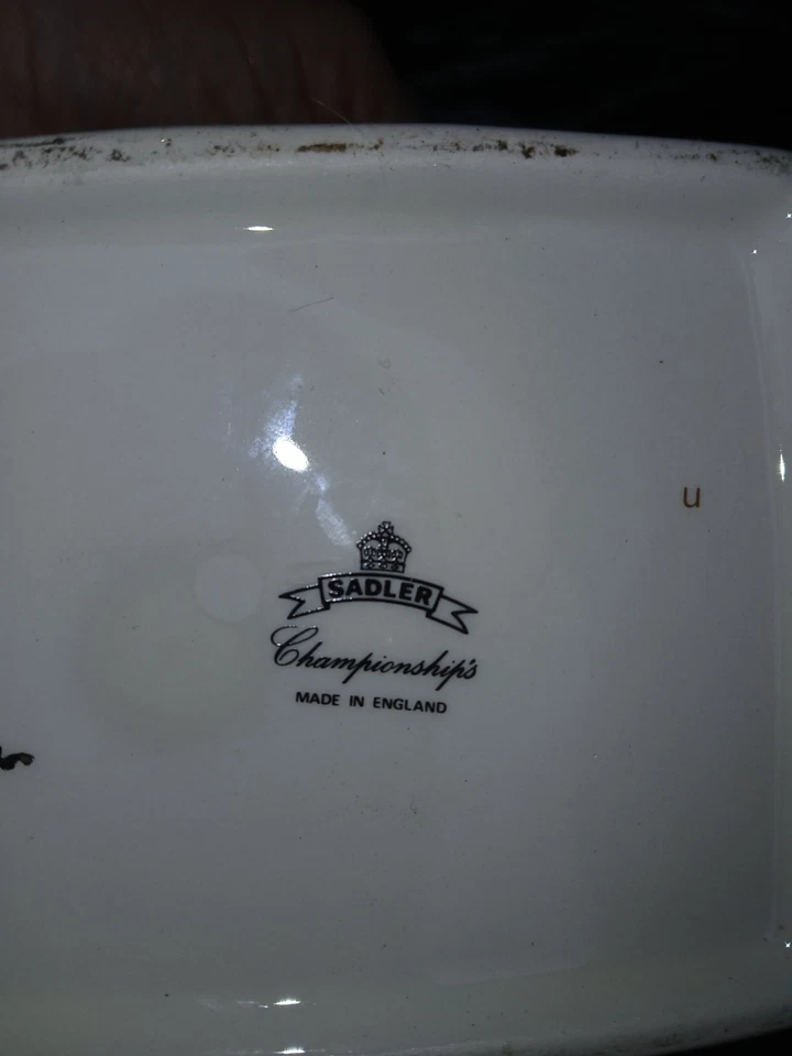 Tetera casa reloj temática de golf Paul Cardew Foto 3 de 3