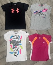 Kids T-shirts Puma, Nike, Under Armor Size 6 Lot Of 4 Multicolor