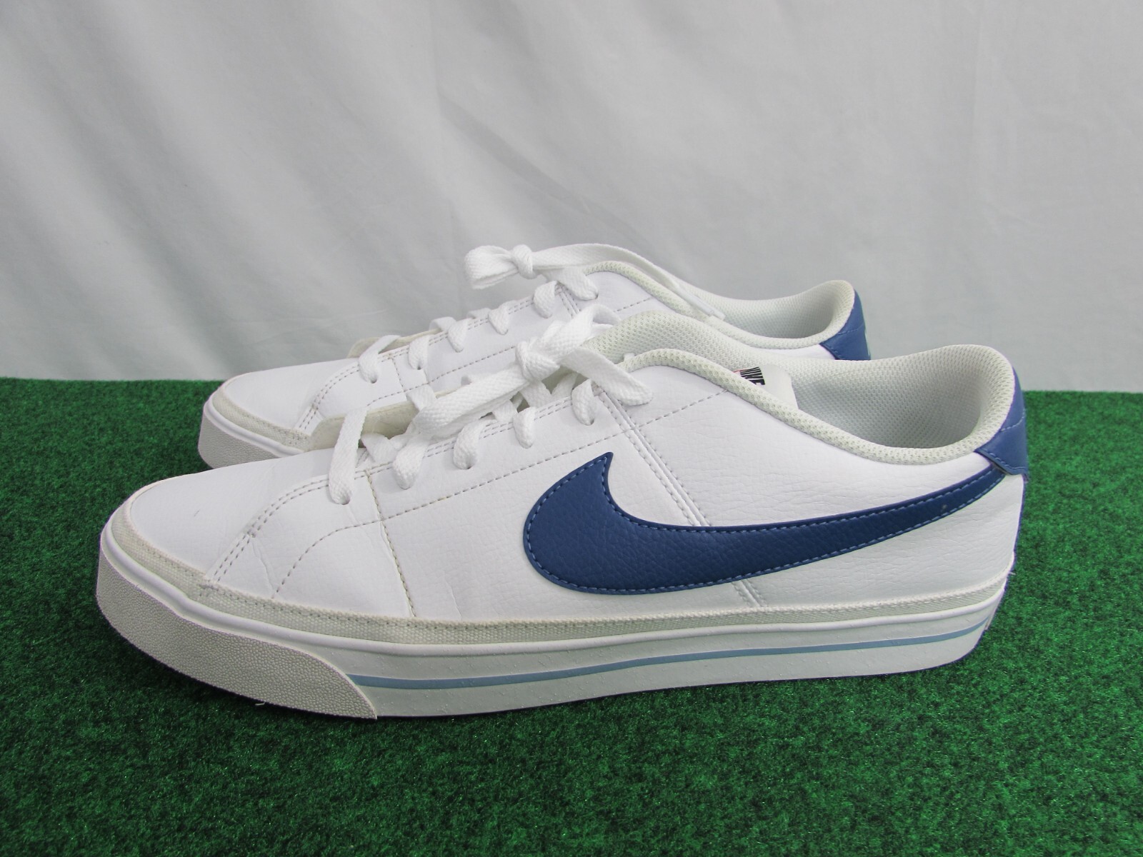 nike court legacy blue and white