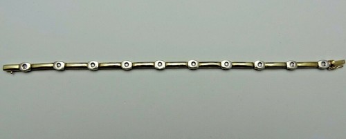 PREOWNED 9CT TWO COLOUR GOLD DIAMOND SET BRACELET. (D33)