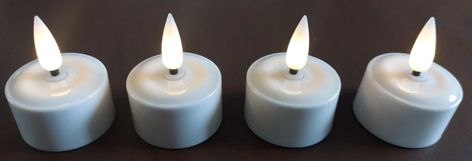 LED Teelichter 4 Stück warmweiß flackernd aufladbar USB Ladestation flammenlos - Bild 2 von 4