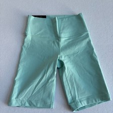 Aritzia TNA Atmosphere 9" Biker Short Women's S Green High Rise Sweat Wicking