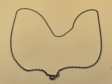 Silver chain necklace (19.5” long) with clasp.