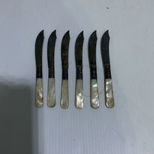 6 mother of pearl Silver  matching fruit knives by Meriden cutlery co. 5.75”