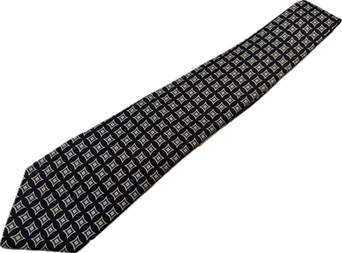 Hand made silk tie with black and white geometric diamond pattern, black tie with gold diamond shapes, on white background.