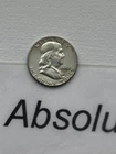 1954 Franklin Half Dollar — 90% Silver — Philadelphia (No Mint Mark) — Raw