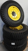 Wolf Paws Skid steer studded snow tires