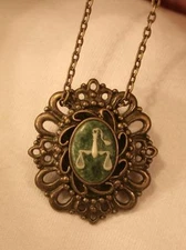 Swirled Rim Brasstone Green White Libra Scales Zodiac Necklace Brooch