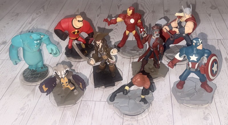 Lot of 9 Disney Infinity Characters: StarLord, Rocket, Jack Sparrow, Cap & more!
