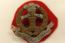 MILITARY BADGE THE MIDDLESEX REGIMENT BROKEN LUG 4CM X 4.5CM (1199)
