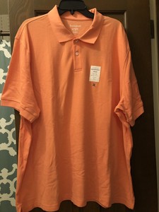 camisa polo color salmon