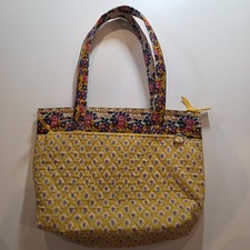 Quilted Floral Tote Bag with Exterior Zipper Pocket.