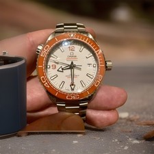 Omega Seamaster Planet Ocean 600m White Dial & Orange Bezel Bracelet Watch.