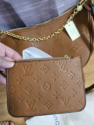 Vuitton Lious Monogram Giant Empreinte Loop Hobo