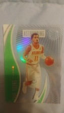 2019-20 Panini Illusions Trae Young Astounding clear Emerald