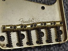 Fender Telecaster brass bridge plate and saddles gold over brass 70s -80