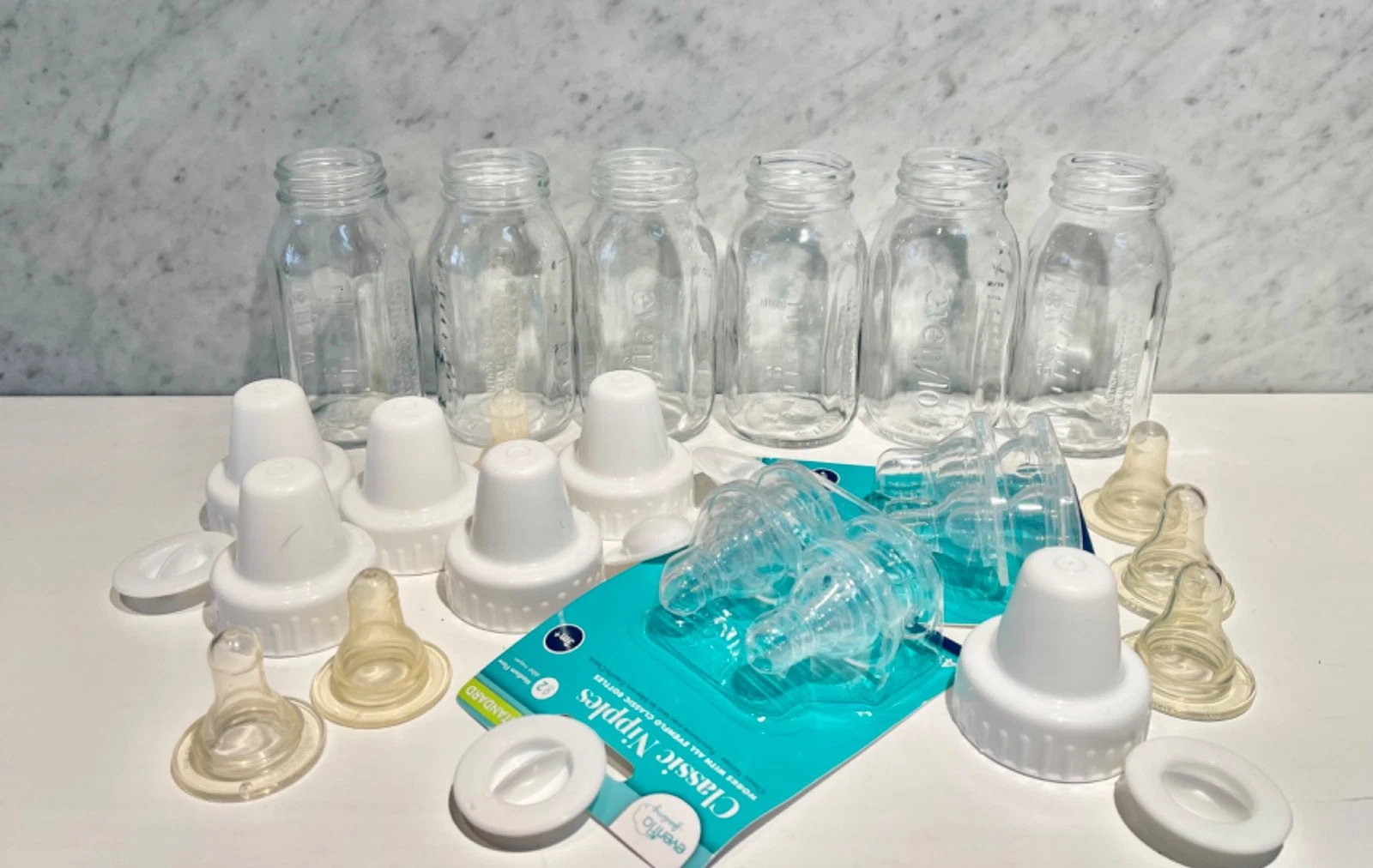 LOT OF 6 EVENFLO CLASSIC GLASS 4 OZ BABY BOTTLES ETC..