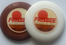 Wham-O Mini set of 2 Frisbee tanning oil