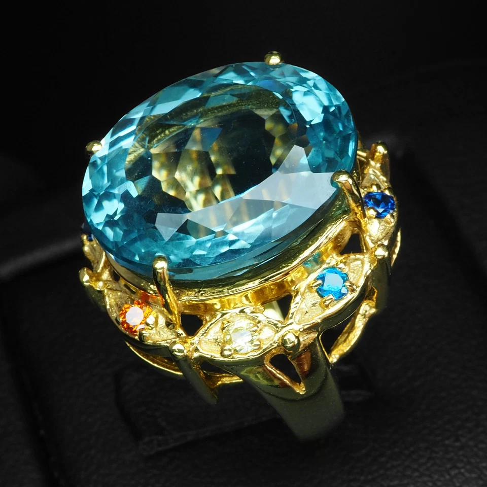 Anillos de oro de 24 quilates de plata de ley 925 bebé topacio azul suizo ovalados 13,48 quilates talla 5,75 Foto 3 de 4