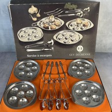 GUY DEGRENNE Schneckenservice aus Edelstahl für 4: Teller Zangen & Gabeln