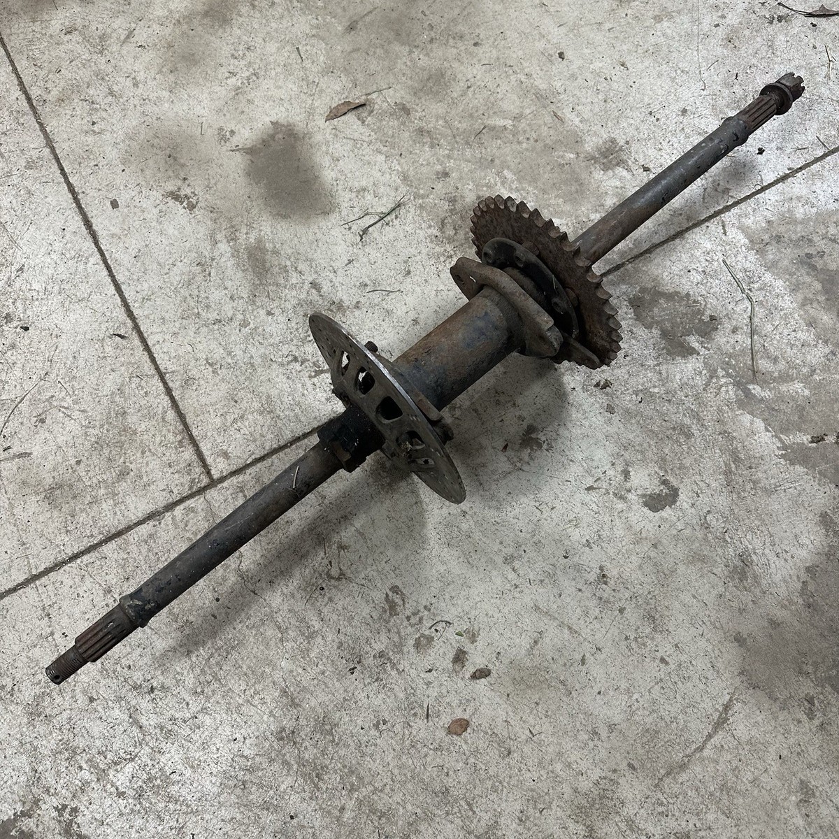 84- 85 KAWASAKI TECATE 3 REAR AXLE CARRIER HOUSING BRAKE SPROCKET