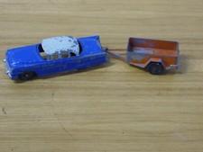 Vtg. Tootsie Toy Packard , with uhaul Trailer look at the pictures