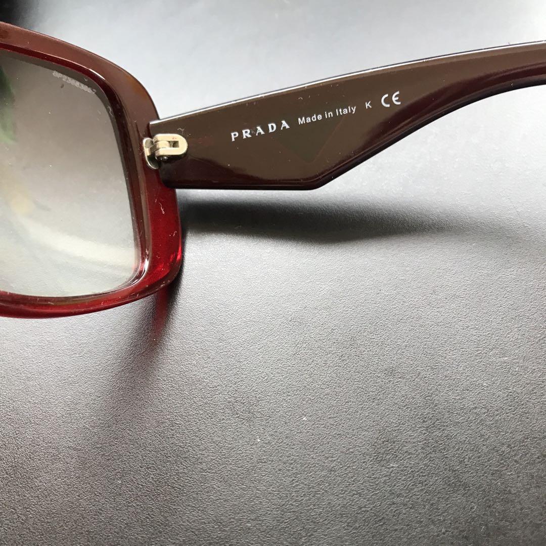 PRADA Sunglasses with Triangle Logo Plate Clear Red From