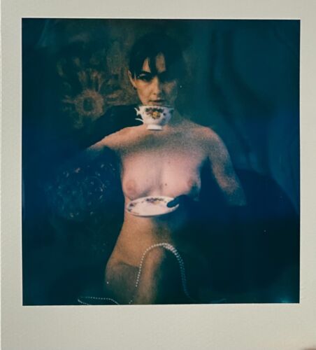 Original Polaroid Beautiful Woman Nude Brunette sipping tea on the couch