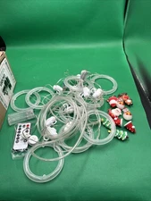 #N73- Christmas string lights with festive figures and remote control, Untested