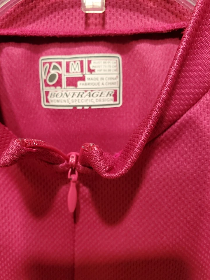 Camiseta deportiva Bontrager para mujer SSR SS WSD ciclismo cremallera frontal bolsillos rosa mediana Foto 3 de 4