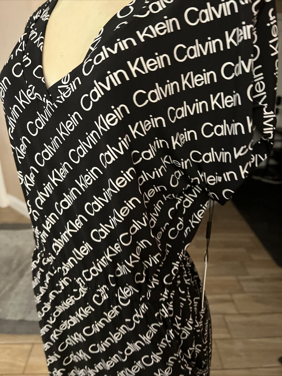 Calvin Klein Pull V Neck CK Logo All Over Print Dress Size 6 Calvin Klein Pull V Neck CK Logo All Over Print Dress Size 6