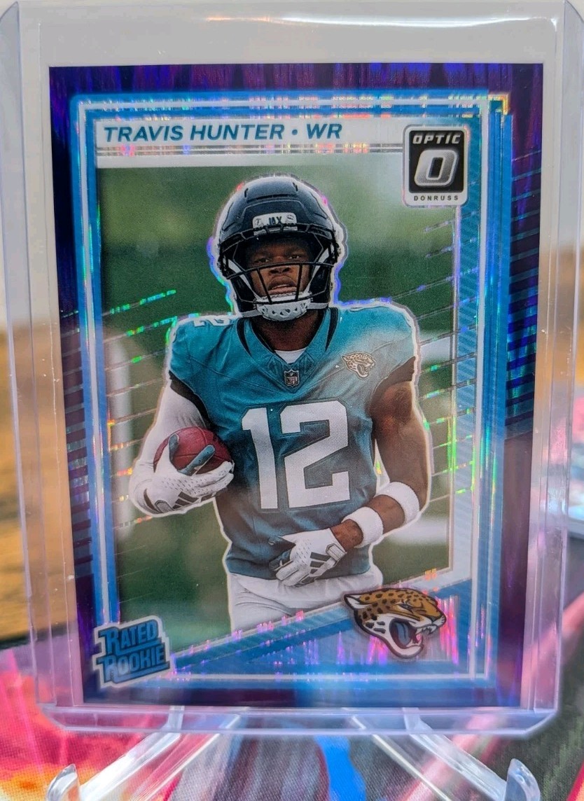 2025 Panini Donruss Optic - Rated Rookie Travis Hunter #201 Purple Shock Prizm