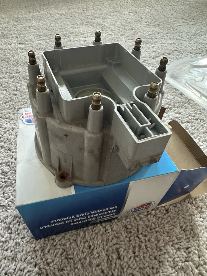 CAE1187 DAA1001 1986 Chevrolet 305 TPI Distribuidor Tapa y Rotor Nuevo Carquest Foto 2 de 4