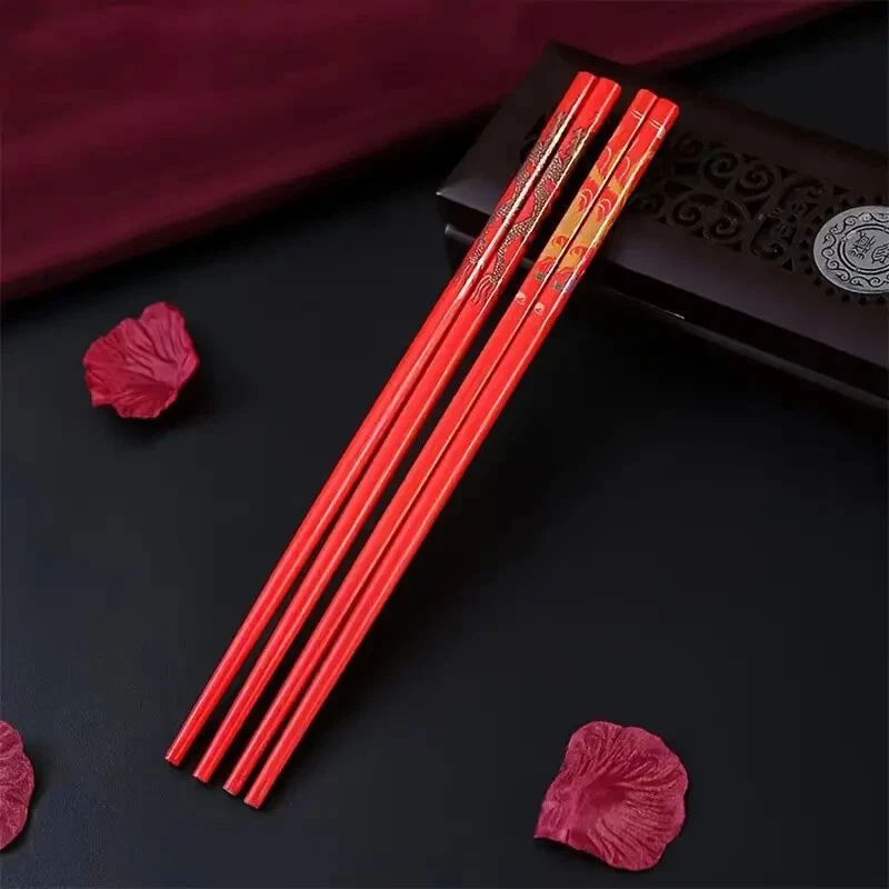 5 pares de palillos dragón con resto Foto 2 de 4