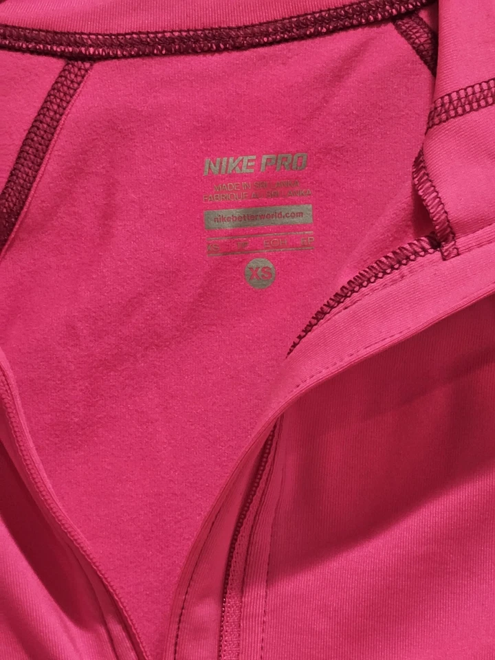 Nuevo con etiquetas Camiseta de entrenamiento Nike Pro Hyperwarm Dri-Fit 1/4 cremallera XS rosa 604885-668 para mujer Foto 2 de 4