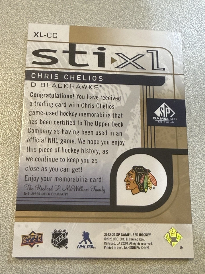 2022-23 Sp Juego Usado Sti-xl #XL-CC Chris Chelios Oro/25 Juego Usado Palo Reliquia Foto 2 de 2