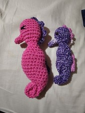 Momma And Baby Seahorse