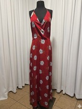 Lush red floral maxi dress featuring a V-neckline and a side slit.