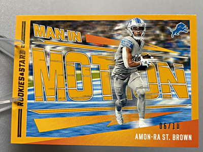 Panini 2023 Rookies & Stars Amon-Ra St. Brown Man in Motion Gold /10 MM-1