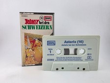 Asterix 16 bei den Schweizern Europa MC Kassette hellblau #1