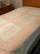 Vintage hand quilted embroidered pink and white quilt